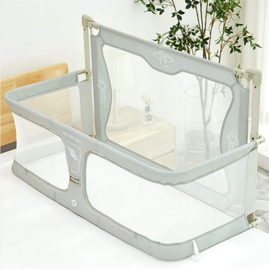 Portable Lightweight Baby Cot Dual-Use: Bedside Crib & Security Rail in a room with plants and furniture.