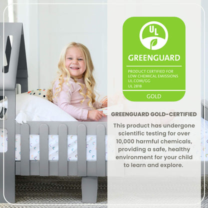 Girl Sitting on Little Partners Lil' House Toddler Bed Silver Drop