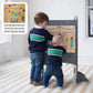 Two Kids Playing Activity Boards attached to Little Partners Limited Edition Learning Tower Grey