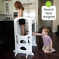 Girl Standing on Little Partners Limited Edition Learning Tower White, with a Boy Drawing on the Blackboard