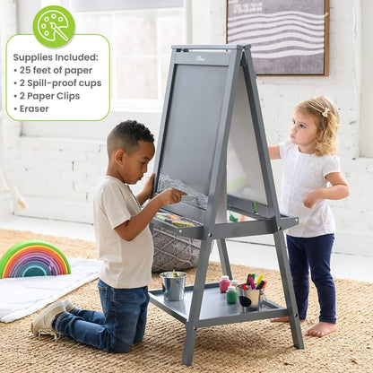 Two children using a Little Partners Folding Artist EZ Easel Grey with art supplies in a home setting.