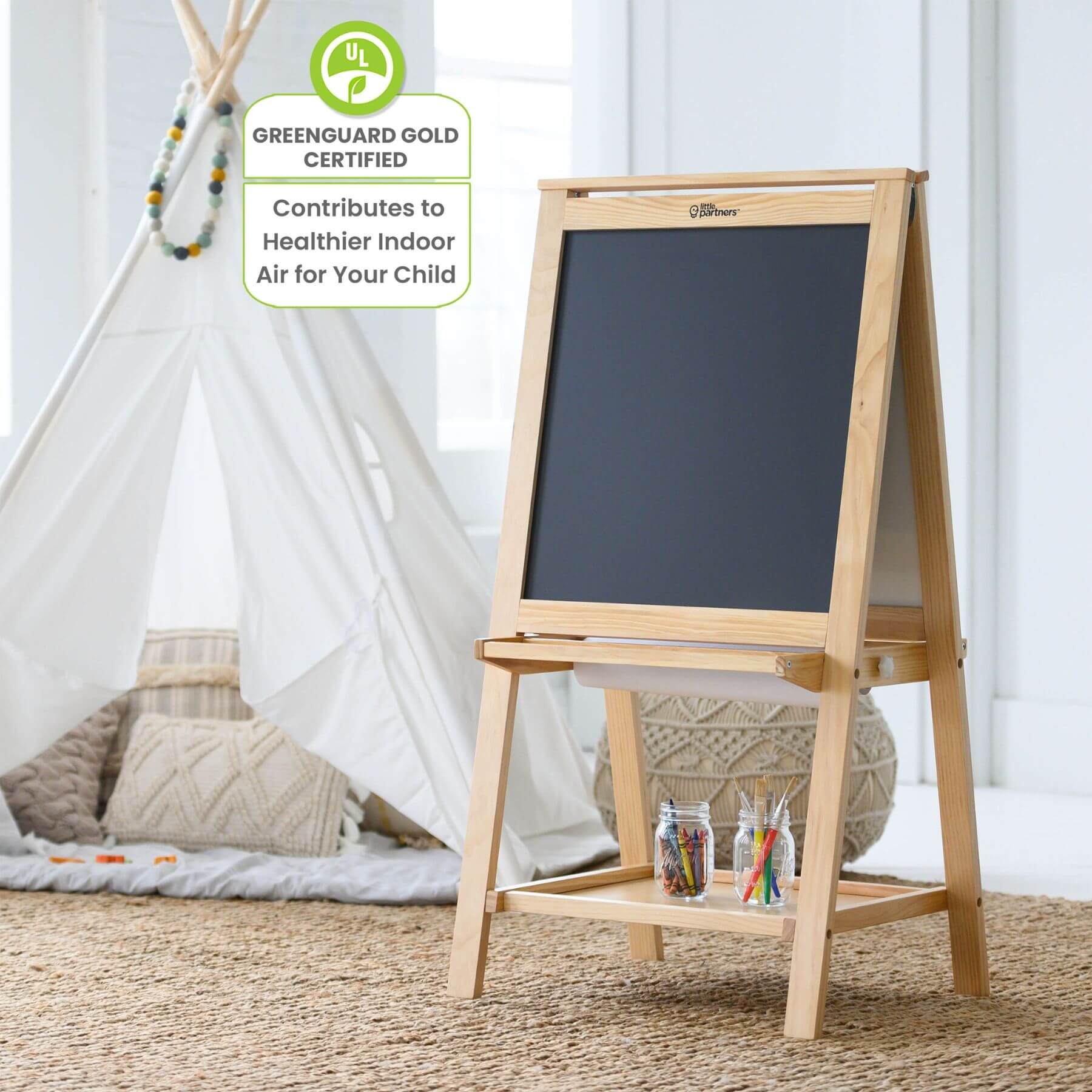 Little Partners Folding Artist EZ Easel Natural in a child's room with a tepee and toys.