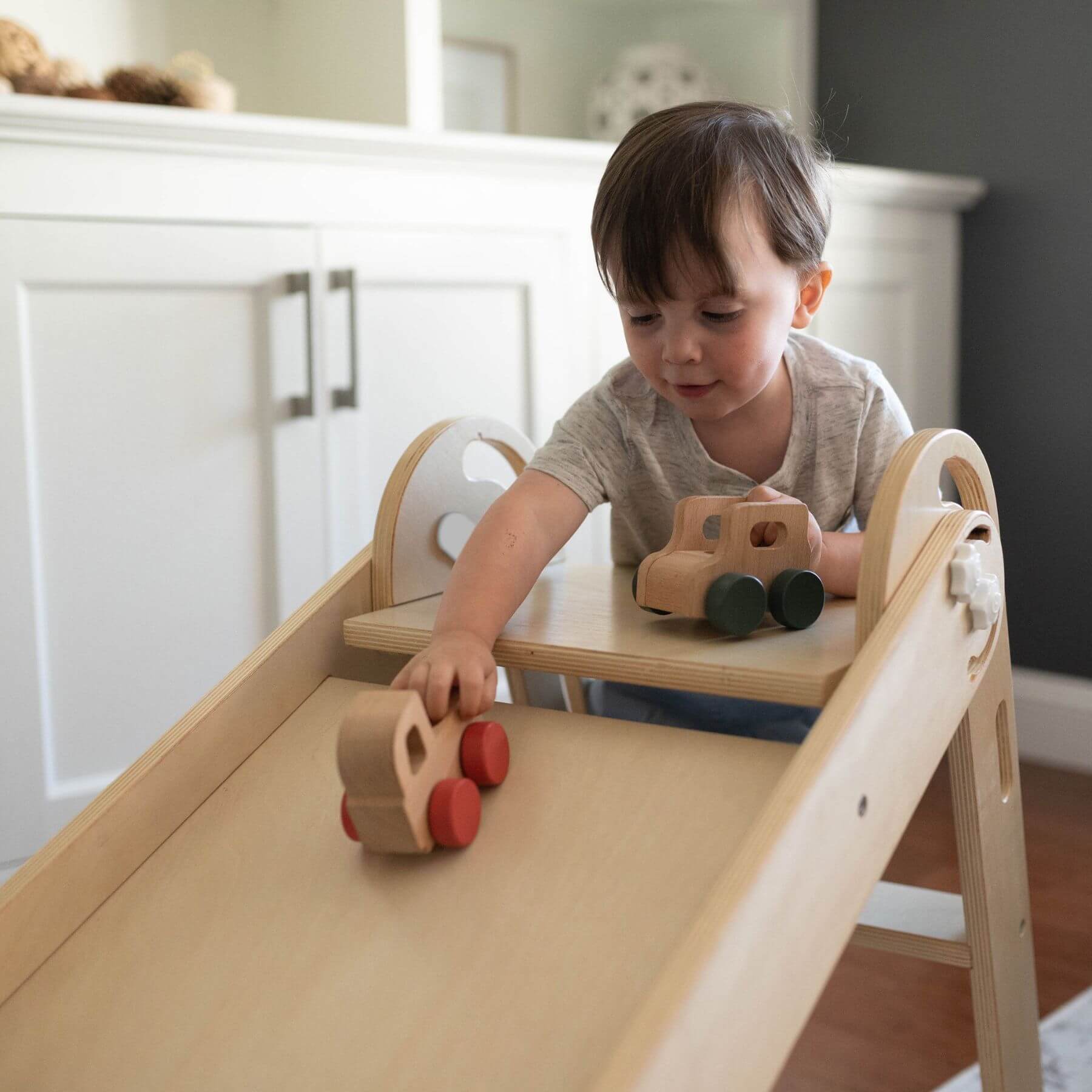 Boy Playing Toys on Little Partners 2-in-1 Learn 'N Slide/Climb