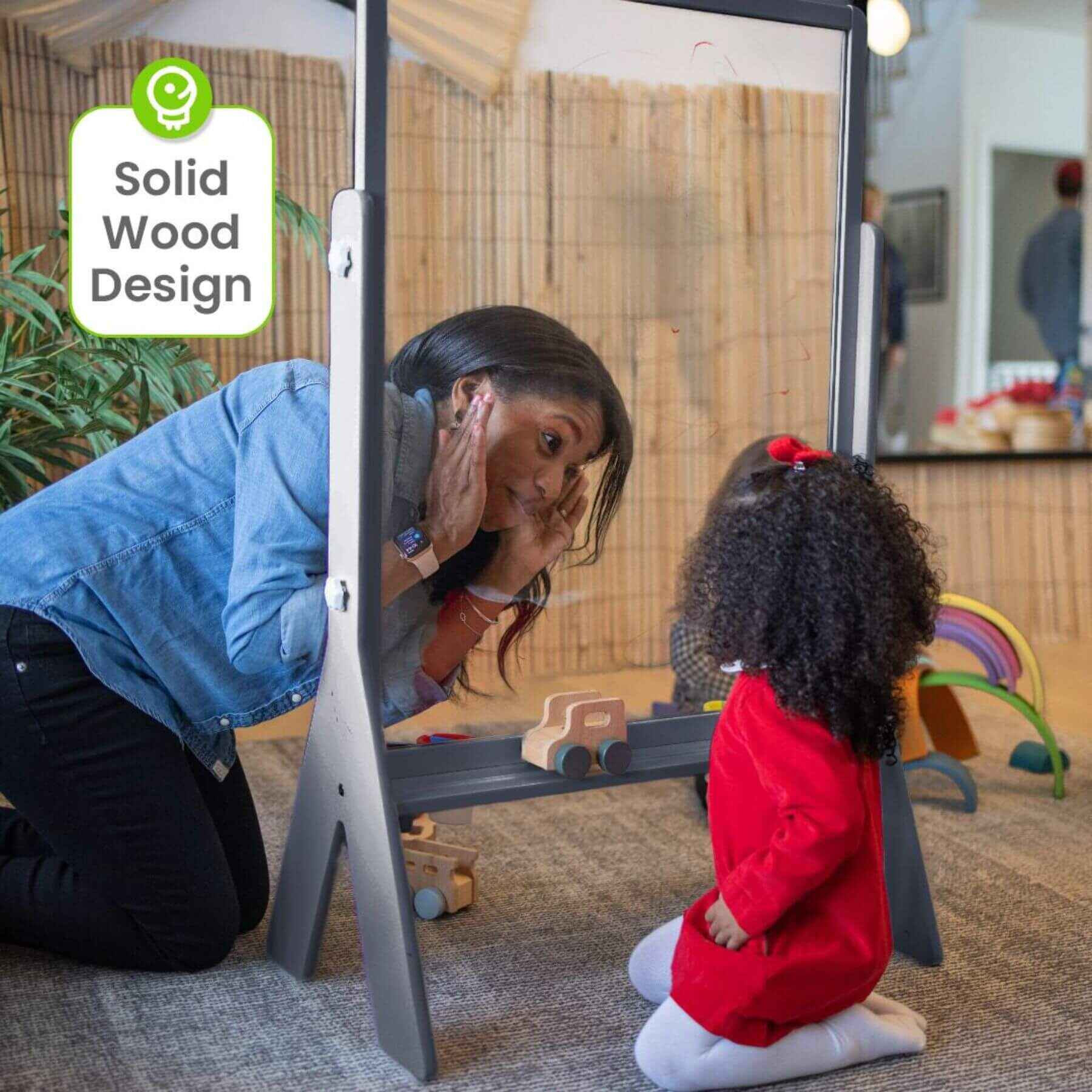 Mom & Kids Drawing on Little Partners Peek-A-Boo Easel Grey