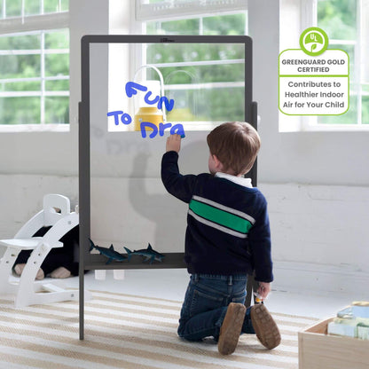 Boy Drawing on Little Partners Peek-A-Boo Easel Grey