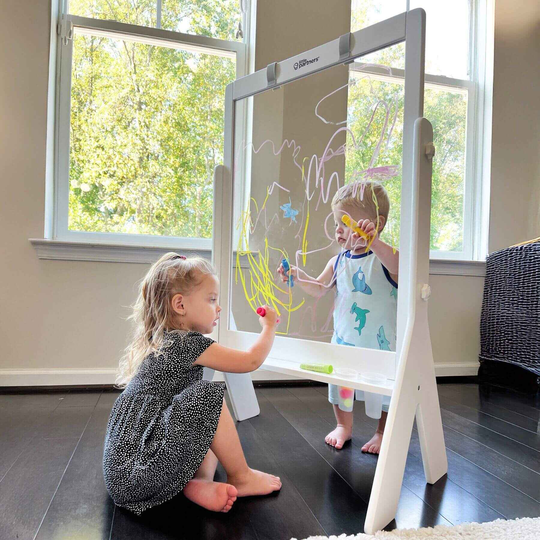 Kids Drawing on both sides of Little Partners Peek-A-Boo Easel White