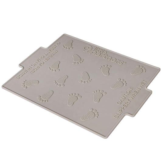 Little Partners Silicone Mat with footprints and text on a white background