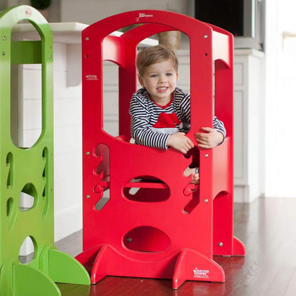 Boy Sitting on the platform of Little Partners The Learning Tower Red