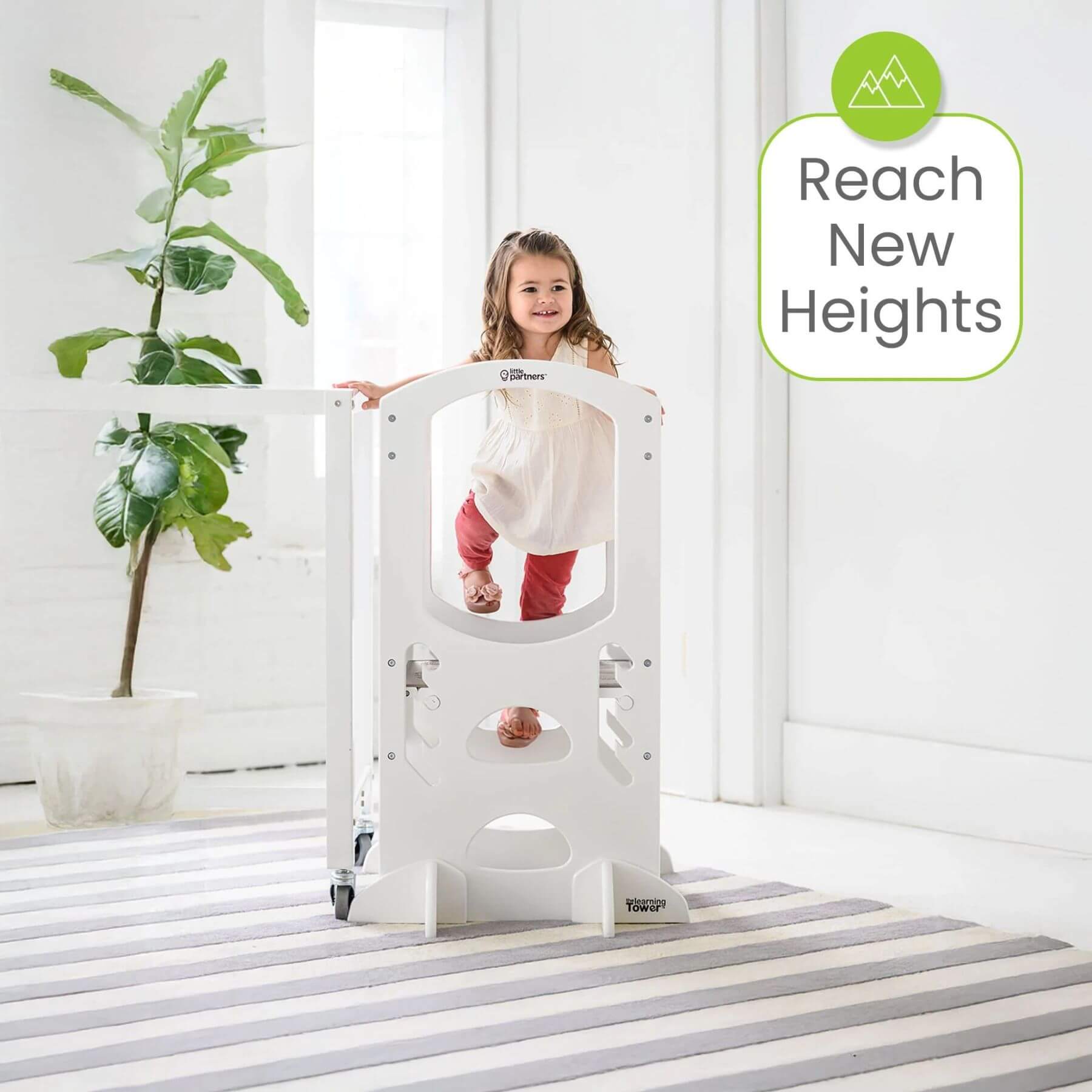 Girl Standing on Little Partners The Learning Tower White