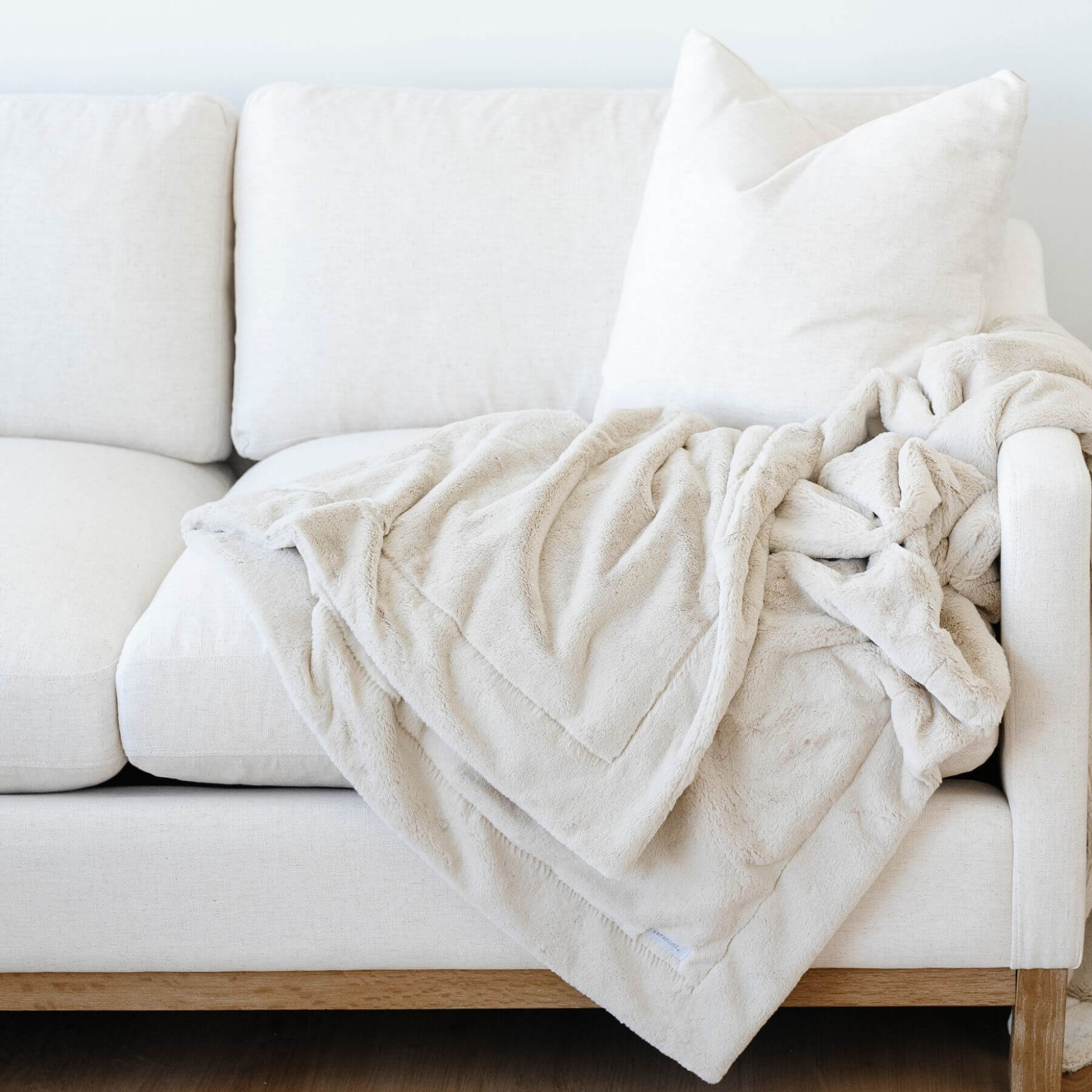 Saranoni Lush Throw Blanket on a couch