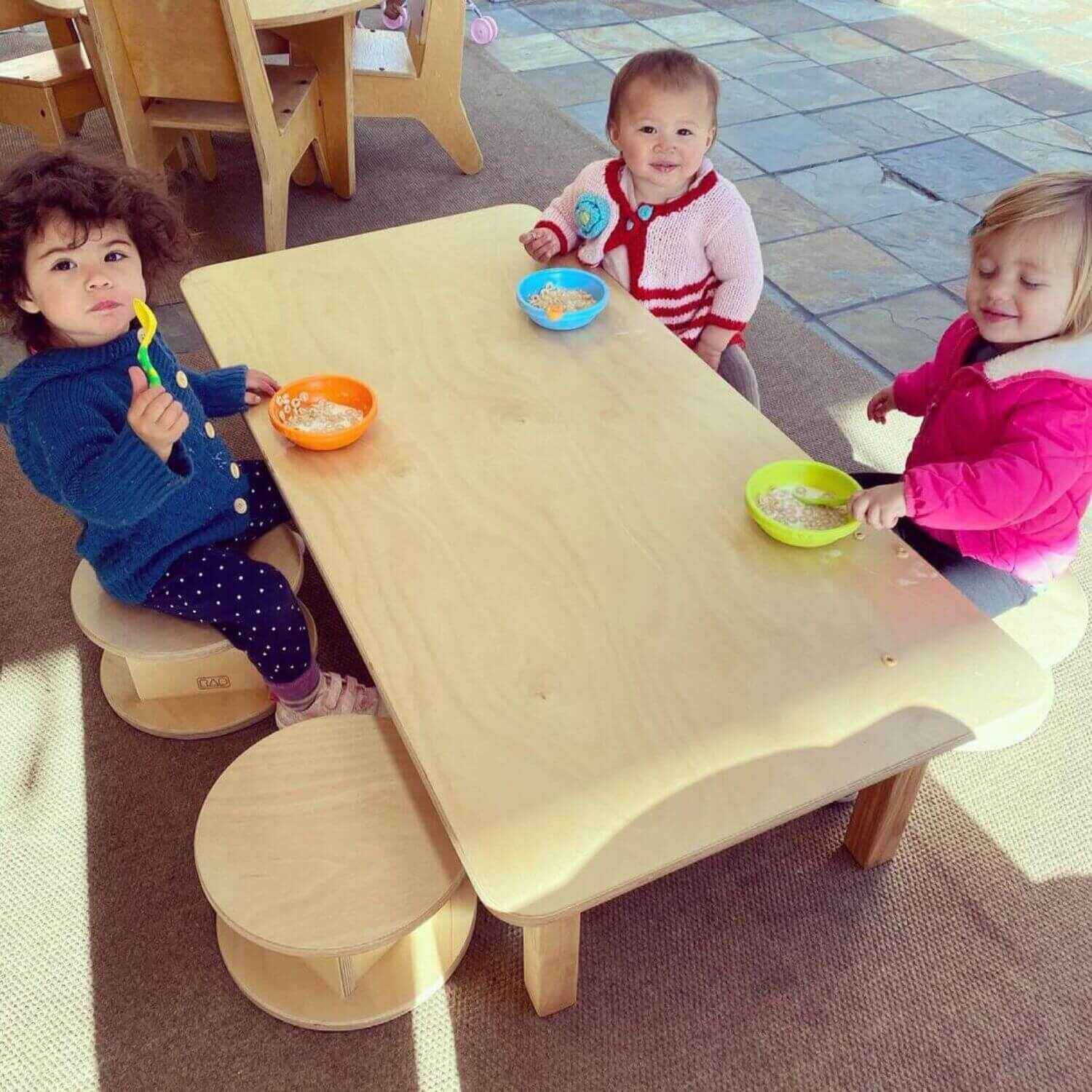 Kids Sitting on RAD Children's Furniture Magda Stool around Table