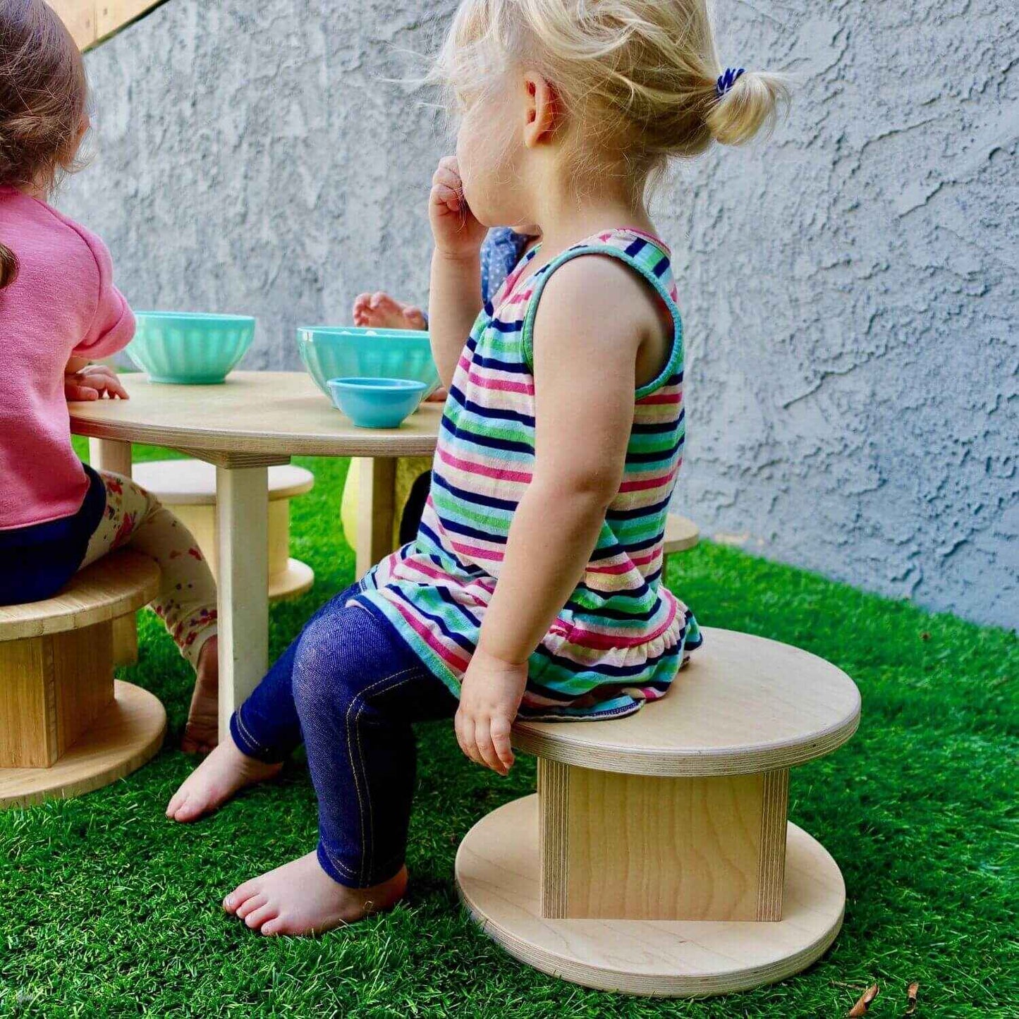 Kid Sitting on RAD Children's Furniture Magda Stool