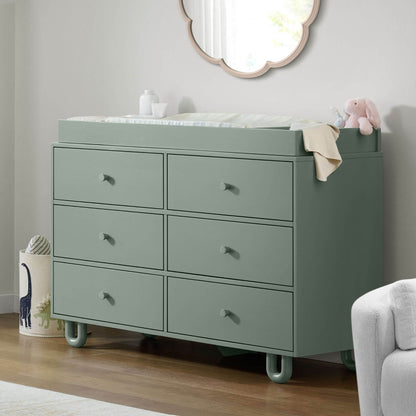 Soho Baby Meridian 6 Drawer Dresser - Olive Green with matching topper in a nursery room