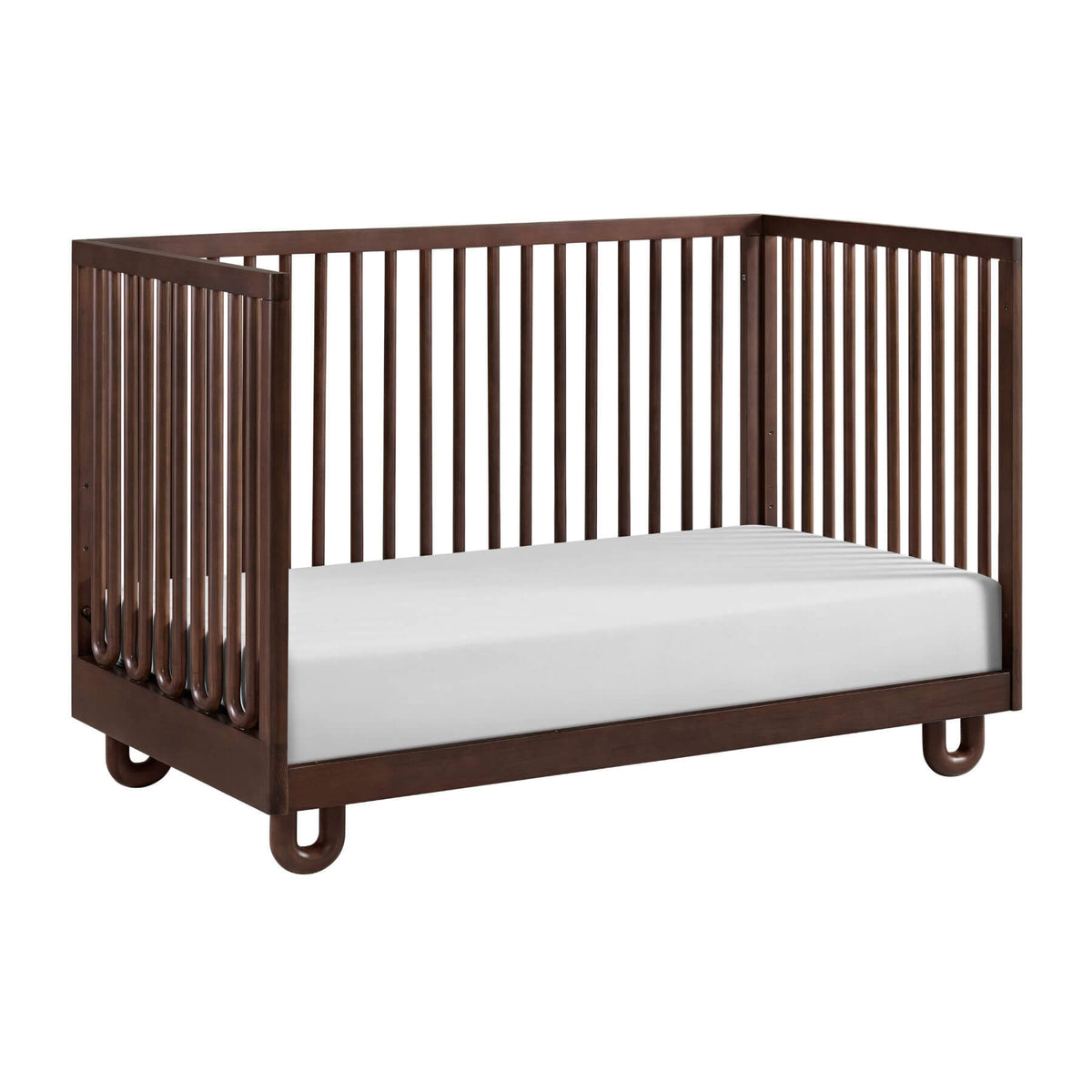 Soho Baby Meridian Island Crib - Cognac shown with a white mattress on a clean white background.