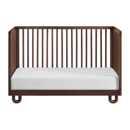 Soho Baby Meridian Island Crib - Cognac and a white mattress fitted, shown against a plain white background.