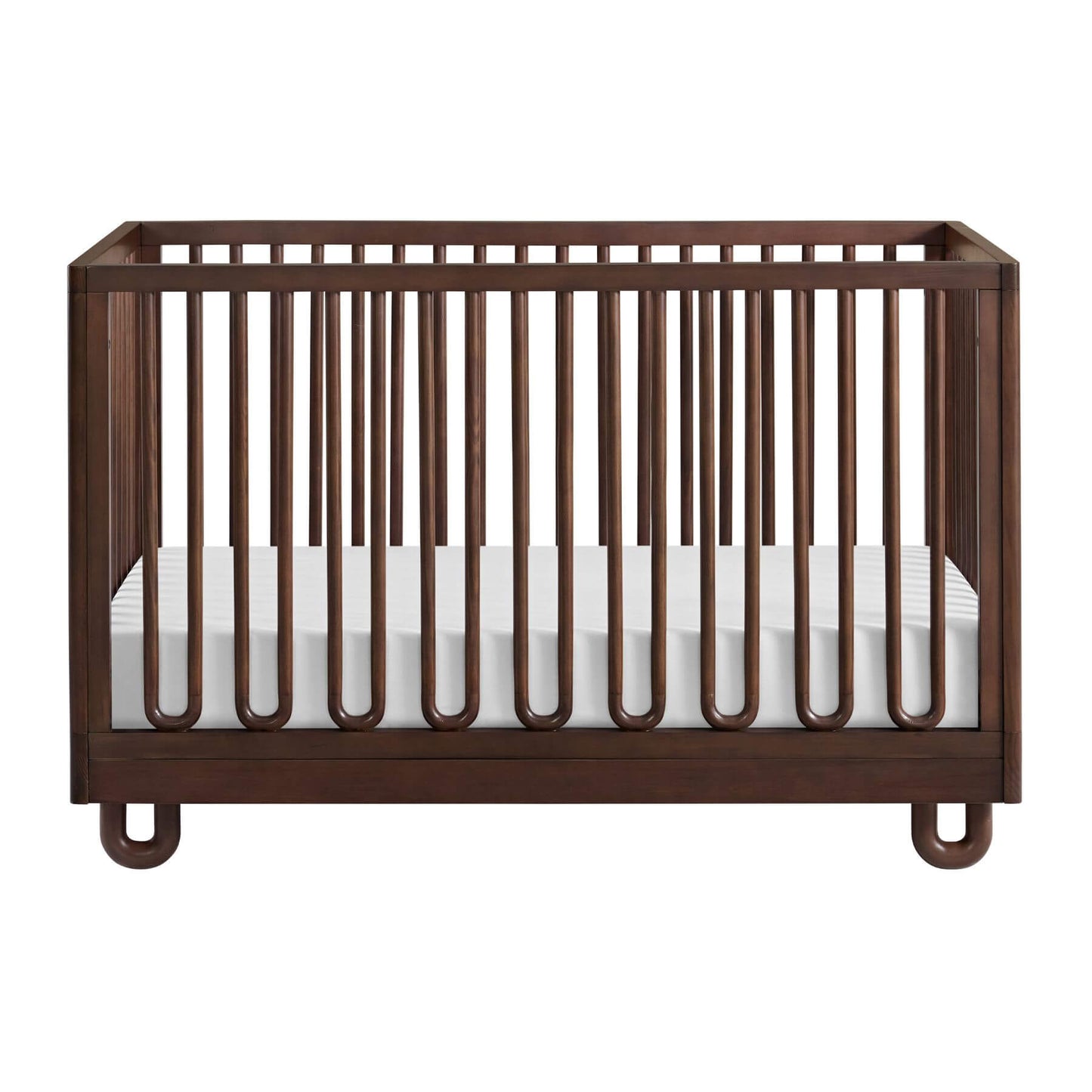Soho Baby Meridian Island Crib - Cognac and a white mattress, shown from a front three-quarter angle on a solid white background.