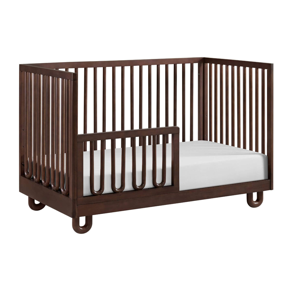Soho Baby Meridian Island Crib - Cognac with white mattress on a white background