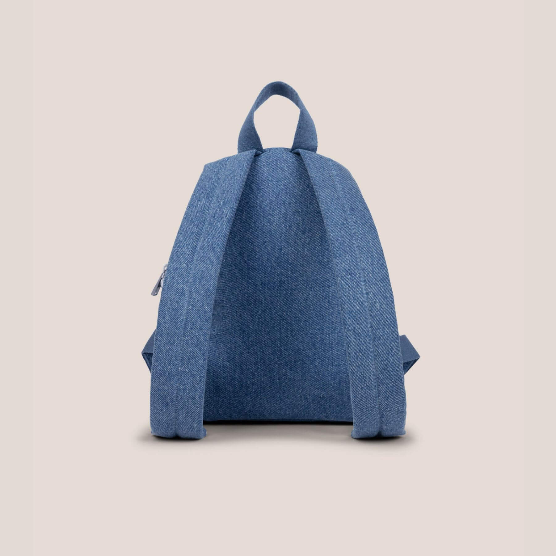 Back view of JuJuBe Everyday Mini Backpack - Denim & Daisies