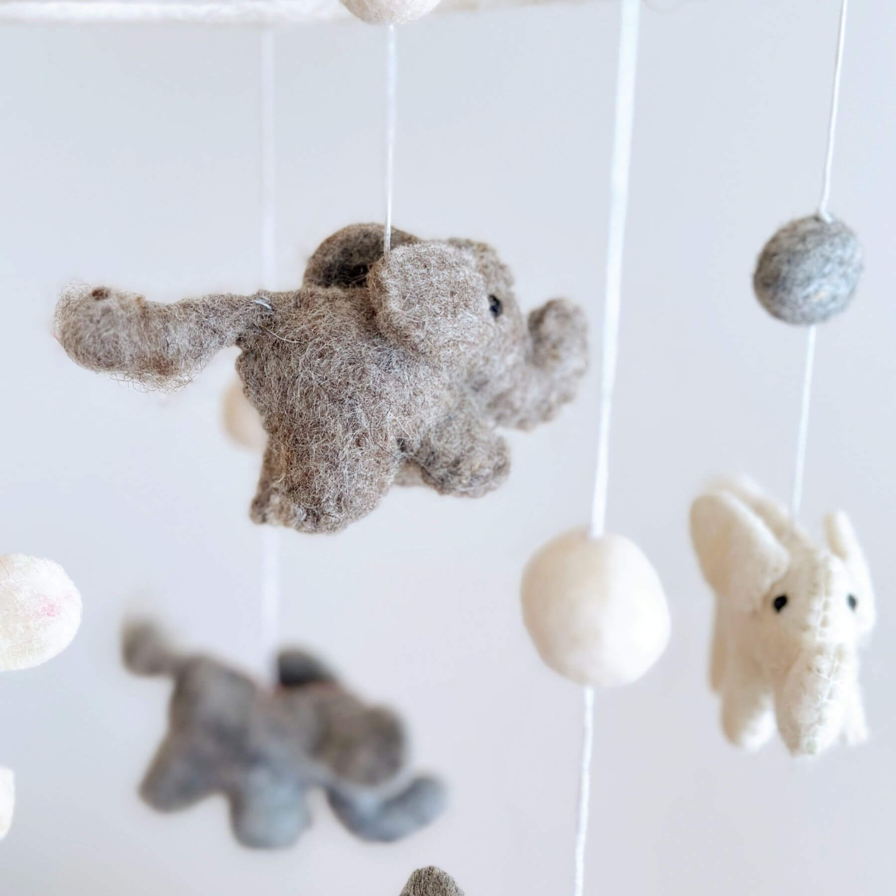 Close-up of Ganapati Crafts Co. Felt Baby Mobile - Mini Elephant
