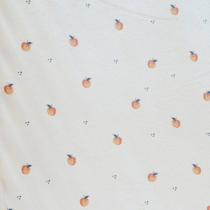 Close-up of Saranoni Minky Stretch Luxe Crib Sheet Apple