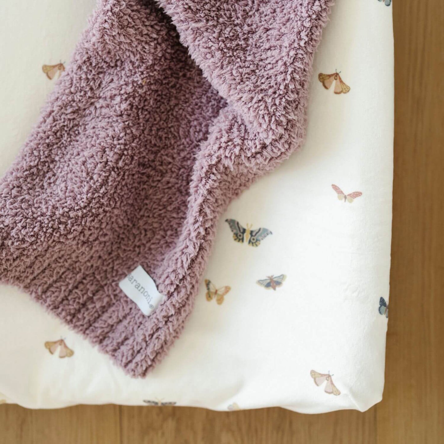 Close-up of Saranoni Minky Stretch Luxe Crib Sheet Butterfly