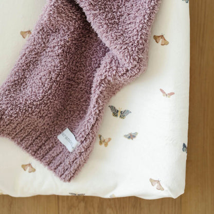 Close-up of Saranoni Minky Stretch Luxe Crib Sheet Butterfly