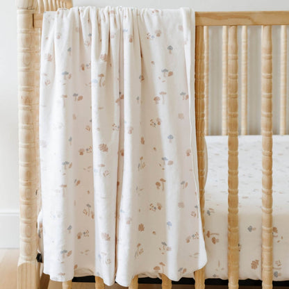 Saranoni Minky Stretch Luxe Crib Sheet Mushrooms hanging on crib