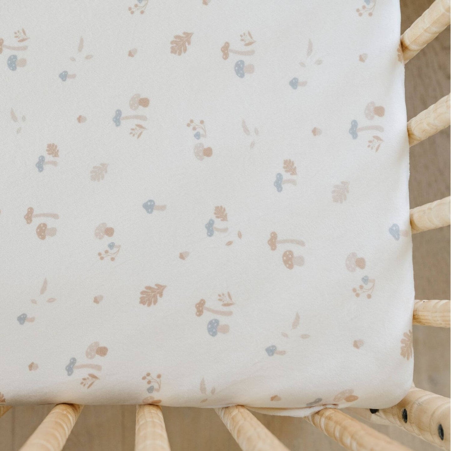 Close-up of Saranoni Minky Stretch Luxe Crib Sheet Mushrooms