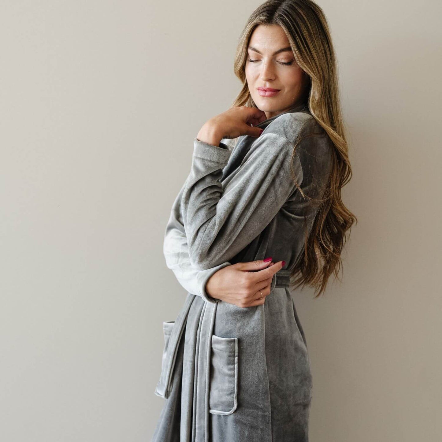 Woman wearing Saranoni Minky Stretch Luxe Robe - Charcoal against a plain background