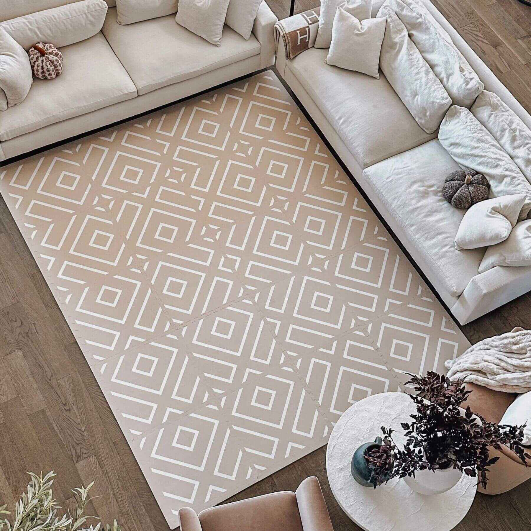 Living room with Eeveve Modern Blocks Play Mat - Beige, beige sofa, and decorative pillows.