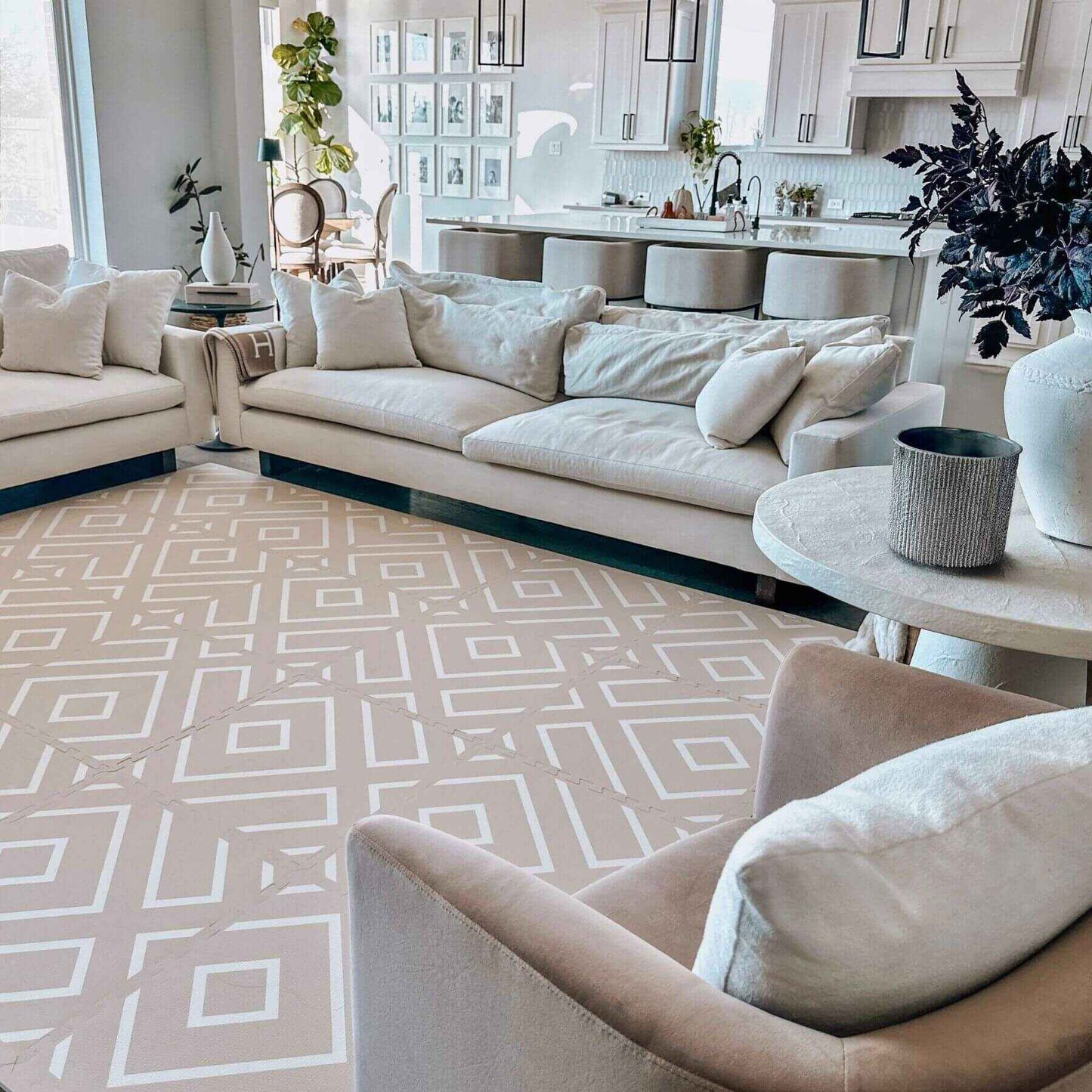 Modern living room with a sectional sofa, armchair, and Eeveve Modern Blocks Play Mat - Beige