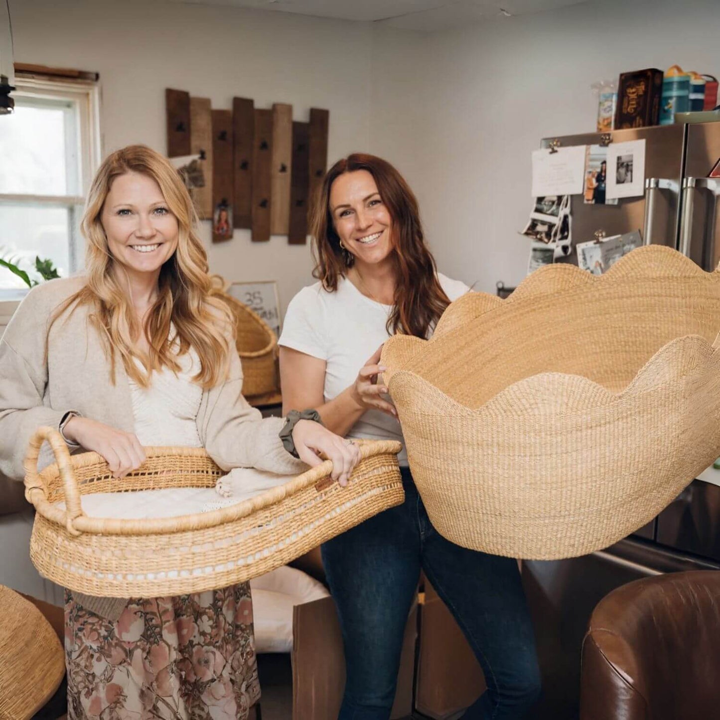 Woman Holding Plum+Sparrow Modern Open Weave Changing Basket