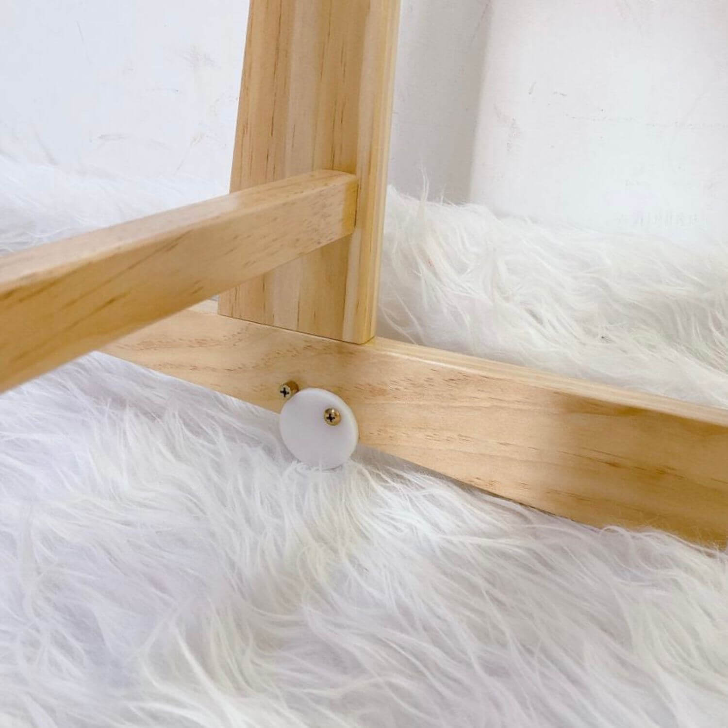 Detail of Plum+Sparrow Modern Rocking Moses Bassinet Stand with Brake Natural