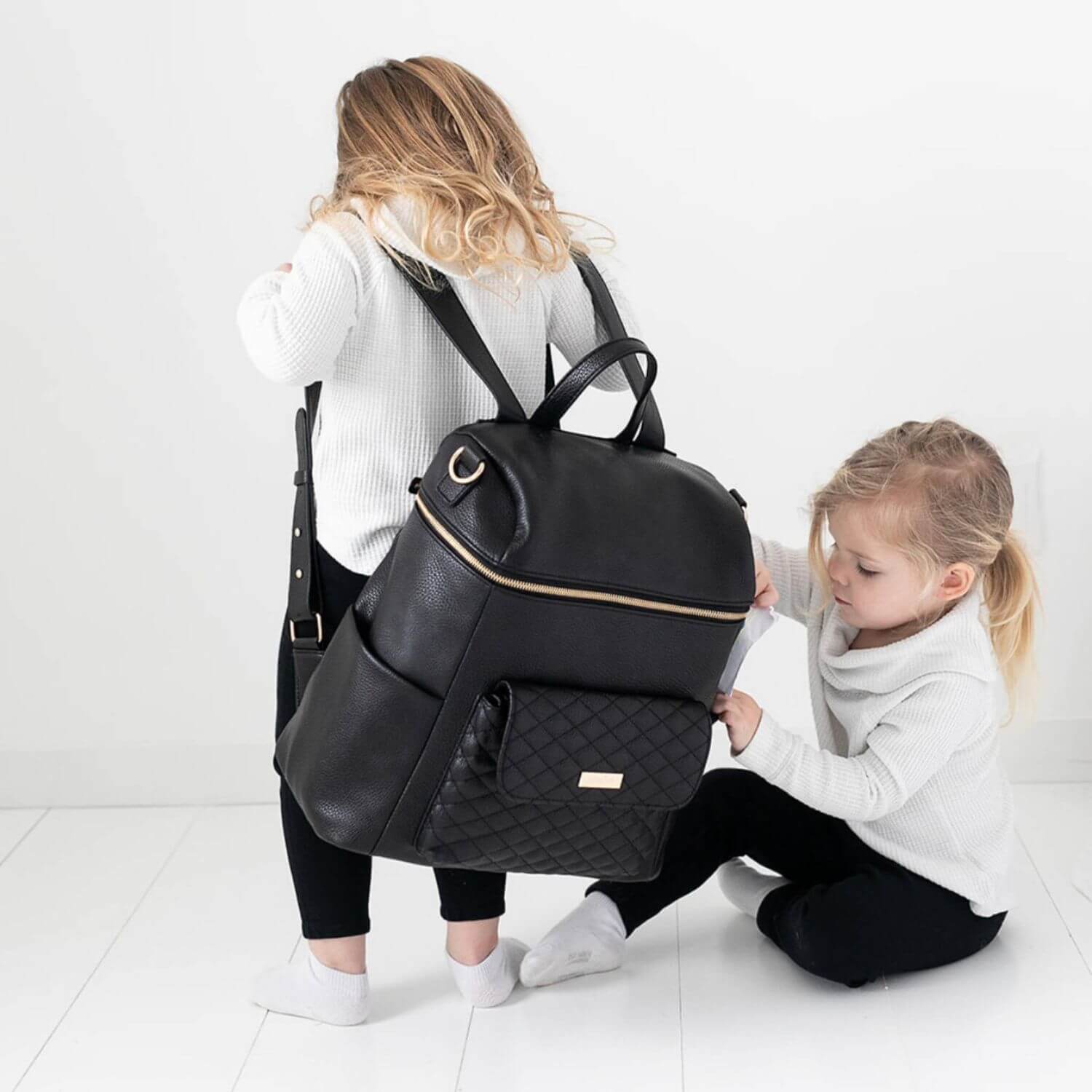 Mom Carrying Luli Bebé Monaco Diaper Bag | Ebony Black