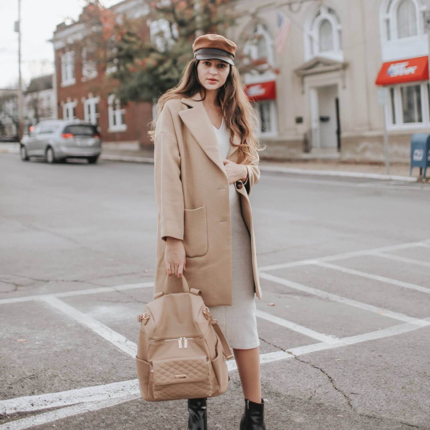 Woman Holding Luli Bebé Monaco Diaper Bag | Latte Brown