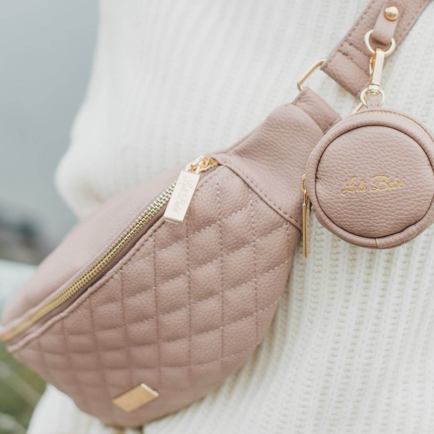 Woman Carrying Luli Bebé Monaco Sling Bag | Nude Rose