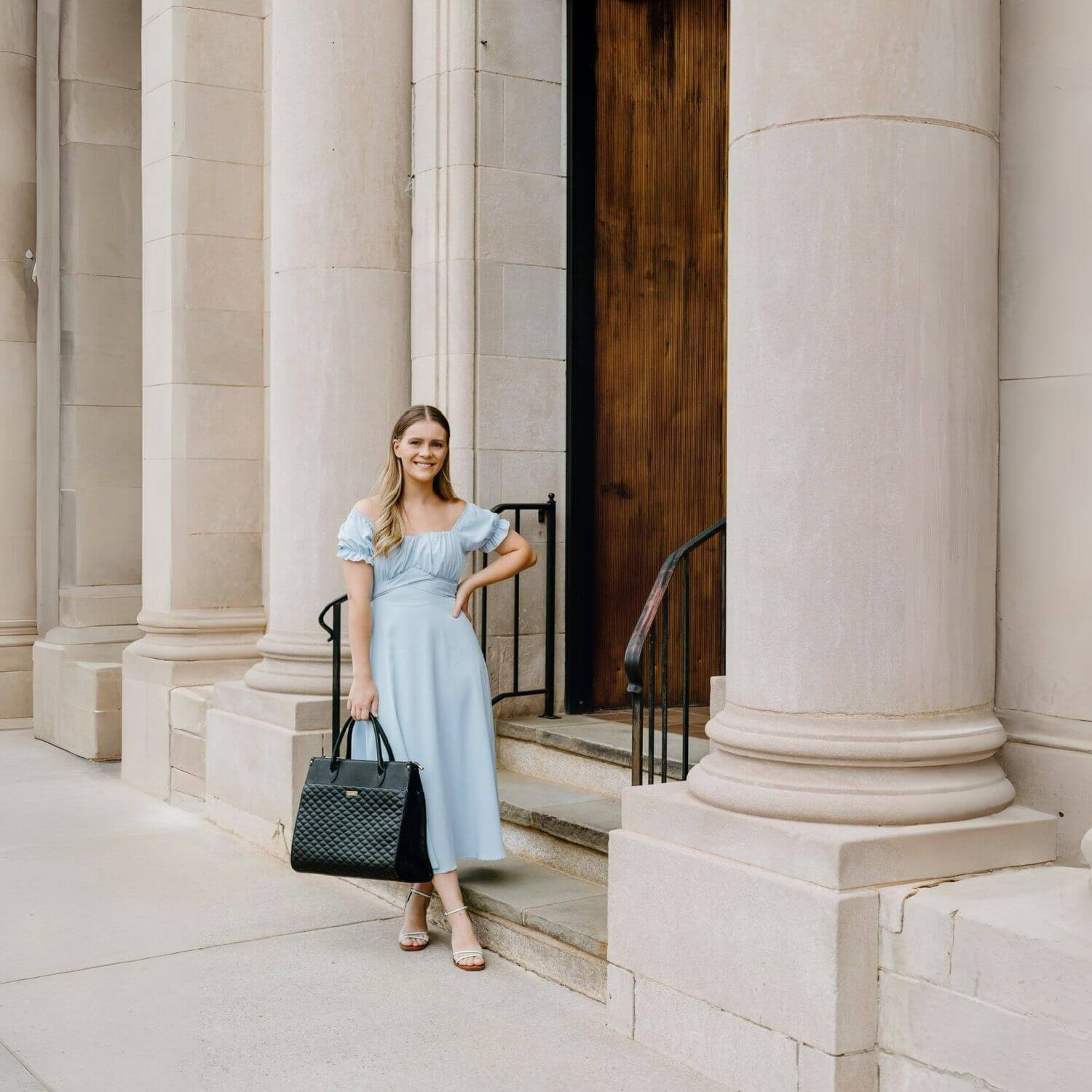 Woman Holding Luli Bebé Monaco Tote Bag | Ebony Black