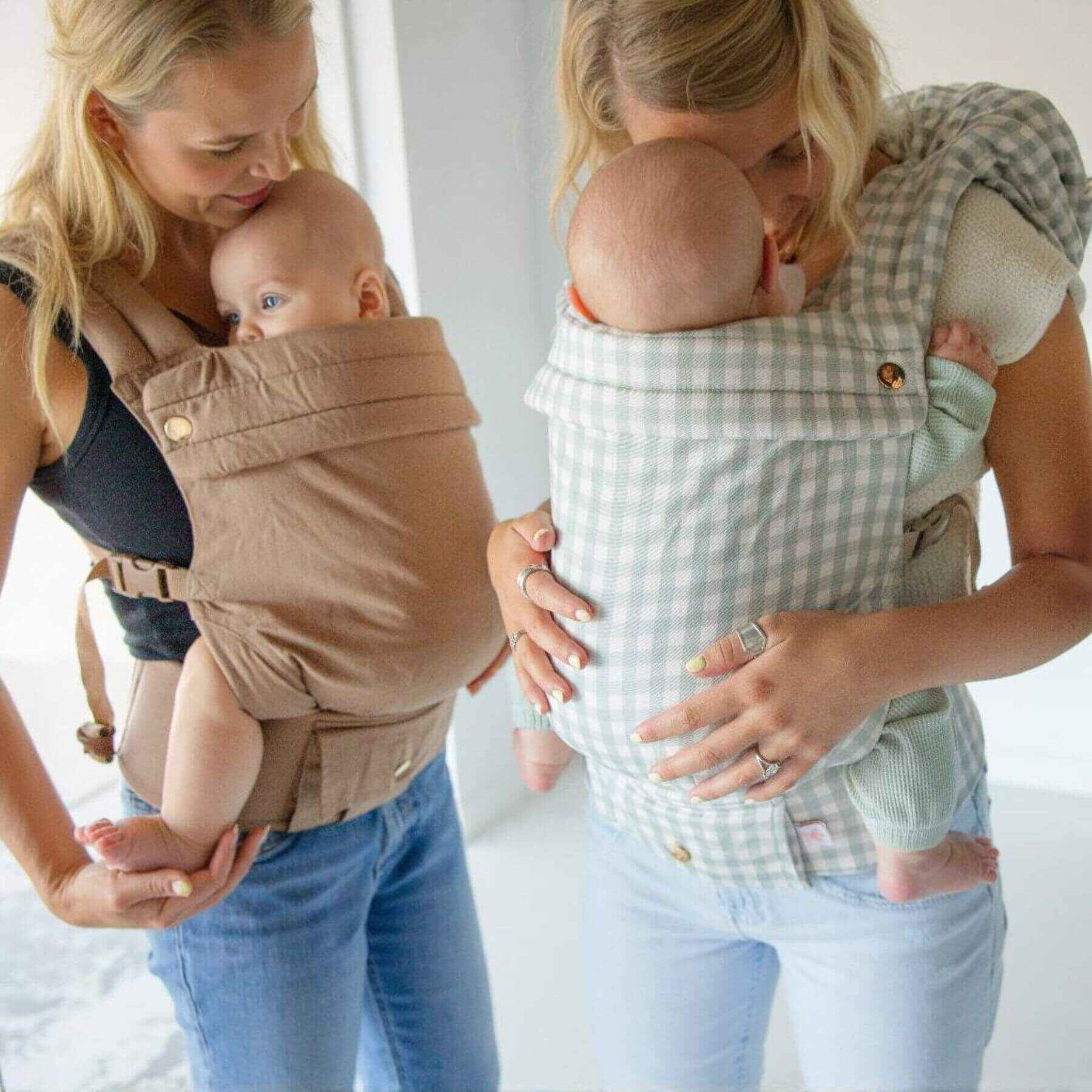 Two women holding babies in Monroe x Coco Desert - Cotton Linen Baby Carriers