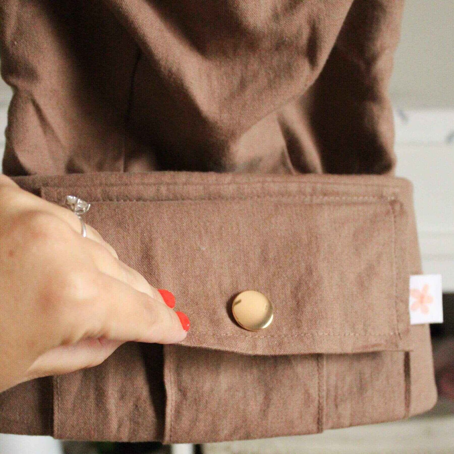 Close-up of Monroe x Coco Desert - Cotton Linen Baby Carrier