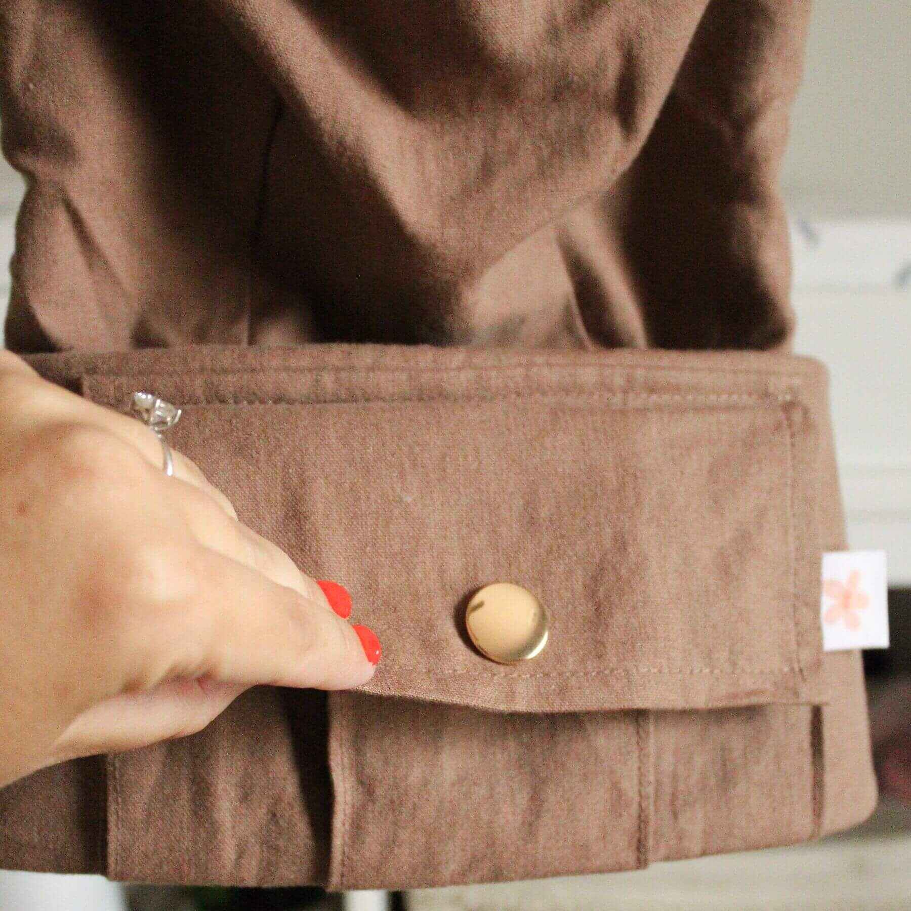 Close-up of Monroe x Coco Desert - Cotton Linen Baby Carrier