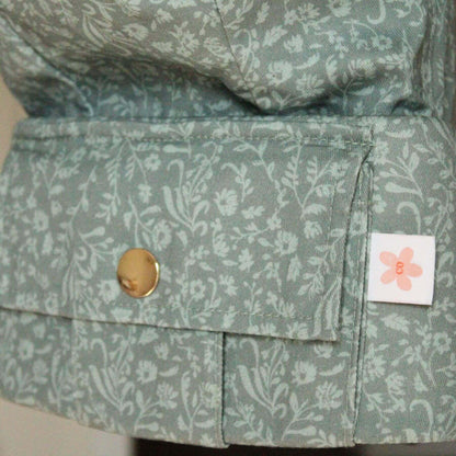 Close-up of Monroe x Coco Bloom – Neutral Cotton Baby Carrier