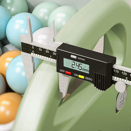 Digital caliper measuring shelf with colorful balloons in the background