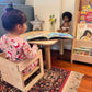 Kid Sitting on RAD Children's Furniture Montessori Cube Chair