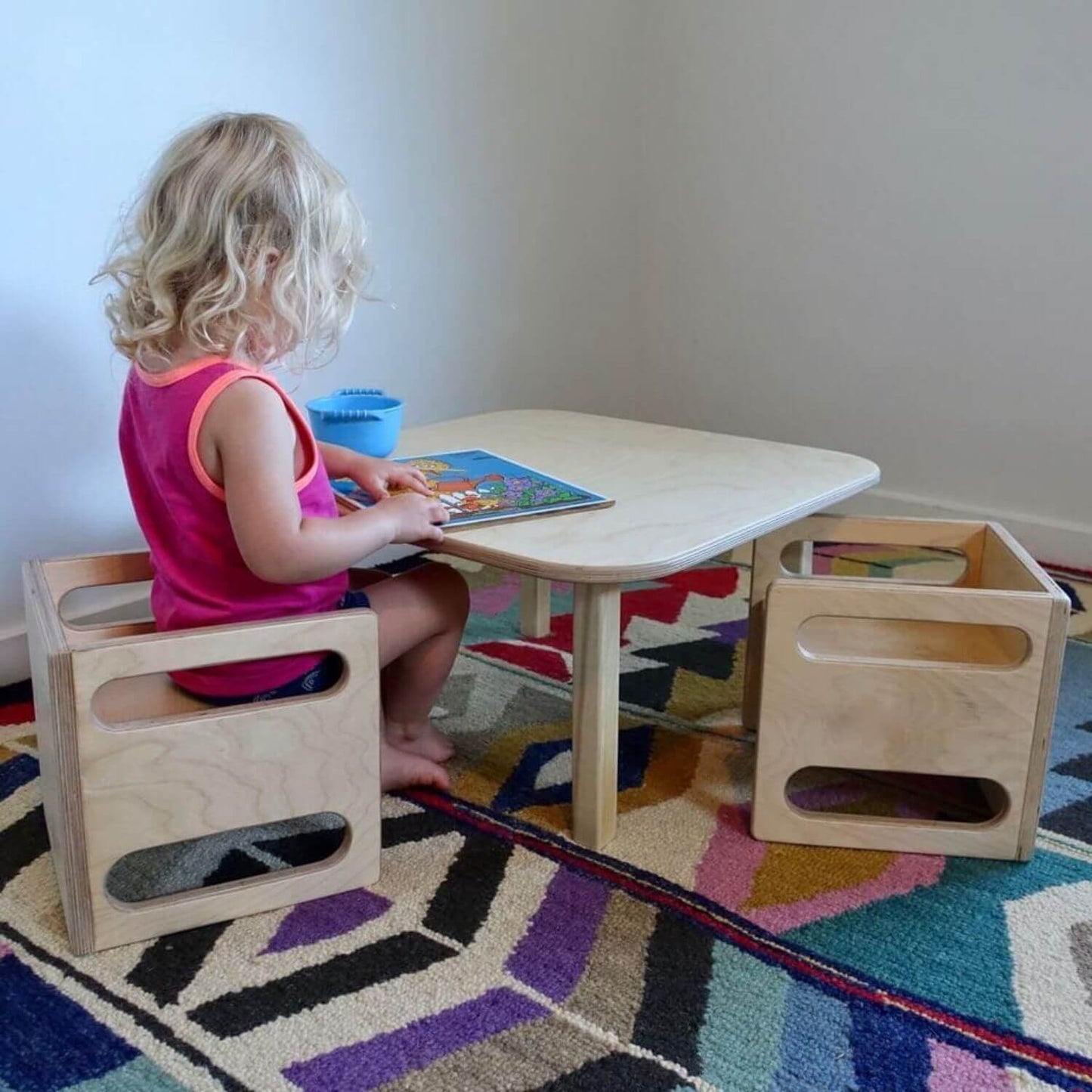 Kid Sitting on RAD Children's Furniture Montessori Cube Chair