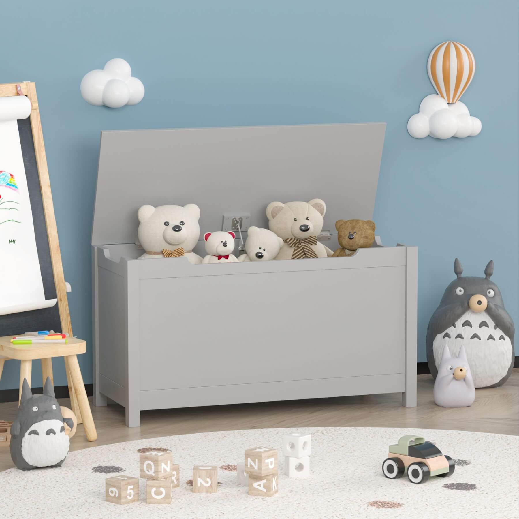 MOONRIVER Kids Wooden Toy Box Storage with Safety Hinged Lid - Grey with stuffed animals in a child's room with a blue wall, white clouds, and a hot air balloon.
