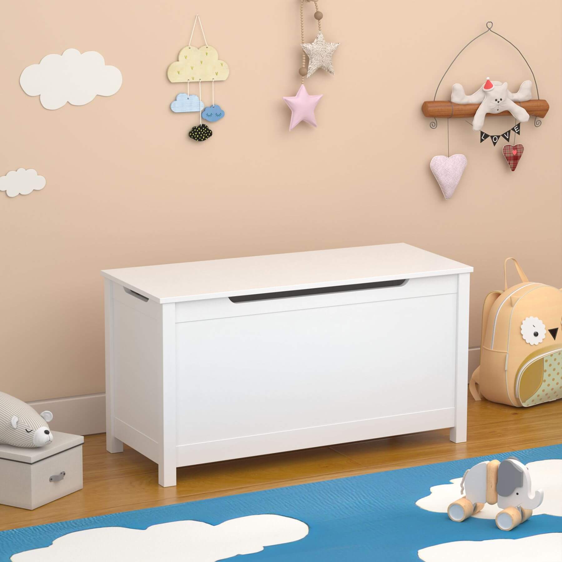 MOONRIVER Kids Wooden Toy Box Storage with Safety Hinged Lid - White in a child's room