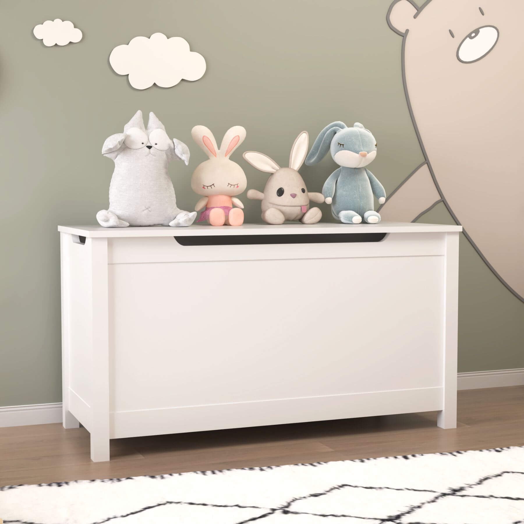 MOONRIVER Kids Wooden Toy Box Storage with Safety Hinged Lid - White with stuffed animals on a wooden floor against a wall with cloud decorations.