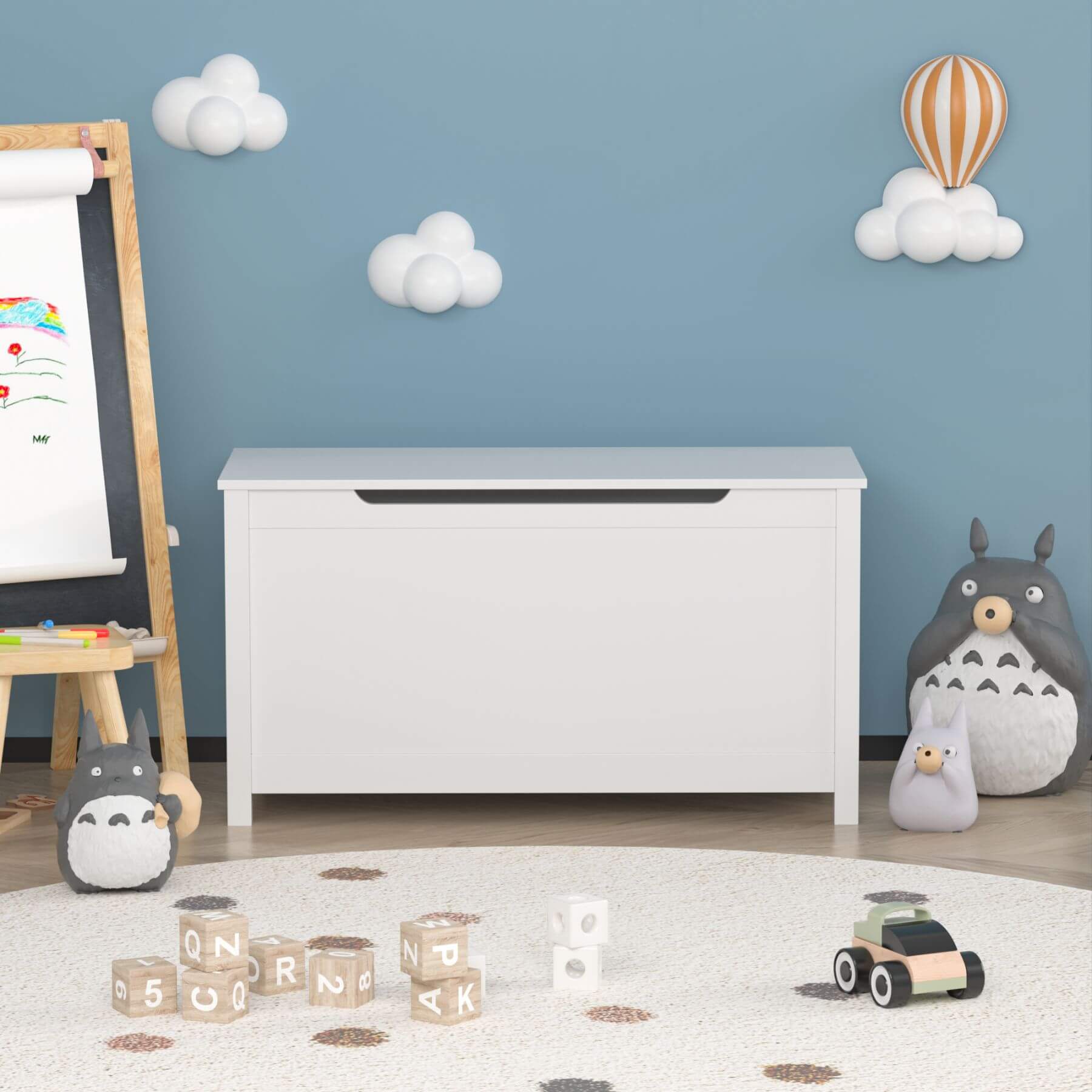 Children's room with MOONRIVER Kids Wooden Toy Box Storage with Safety Hinged Lid - White, colorful blocks, and a Totoro plush toy.