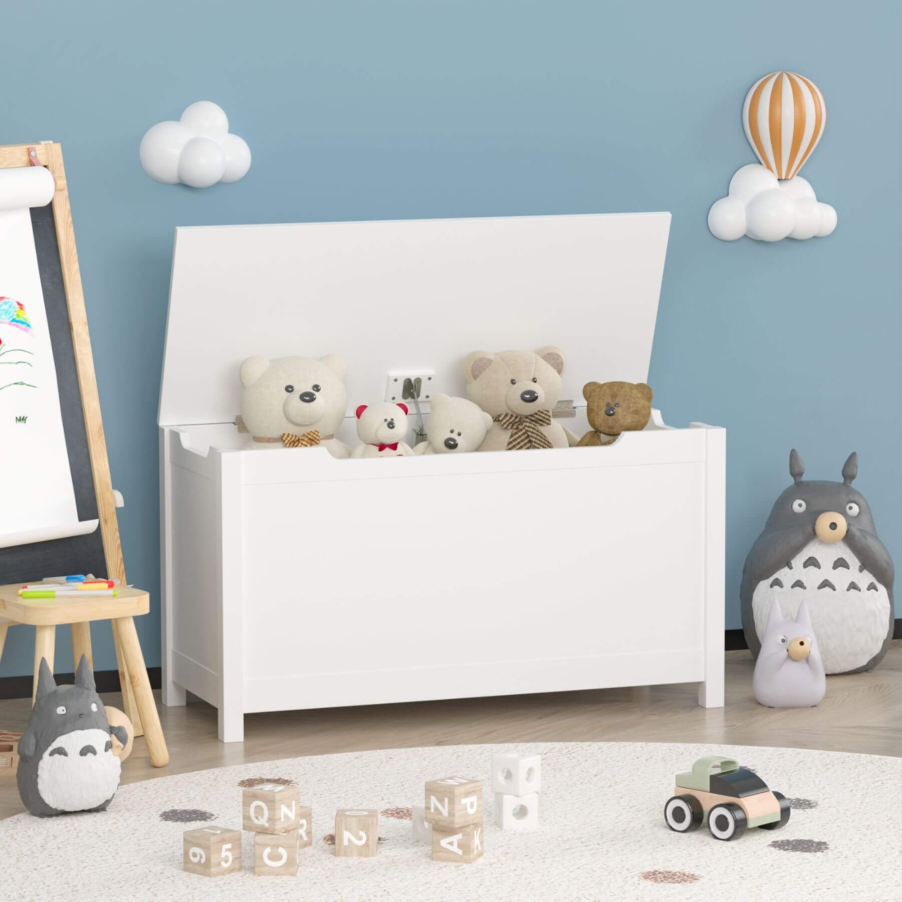 MOONRIVER Kids Wooden Toy Box Storage with Safety Hinged Lid - White with stuffed animals in a child's room with a blue wall, toys, and a whiteboard.
