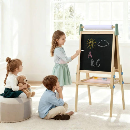 Children playing with a wooden easel in a bright room.